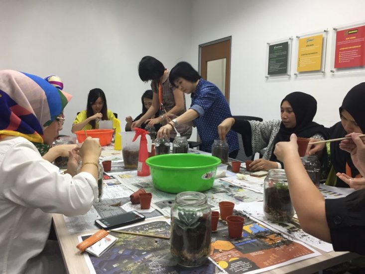 EcoKnights Engages With Guardian Staff in Terrarium Workshop